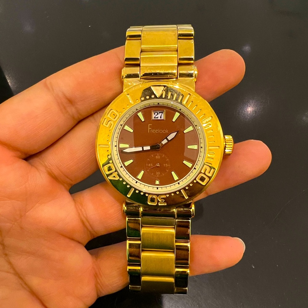Freelook men’s gold watch